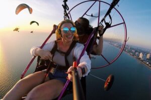 dog shelter volunteer flying above Pattaya